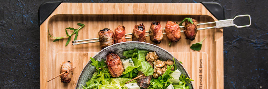 Baconlindad torkad frukt på grillen